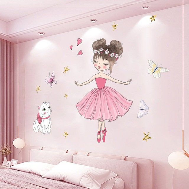 A whimsical wall mural depicting a ballerina in a pink dress surrounded by butterflies and stars. A cute white dog is also illustrated beside the ballerina.